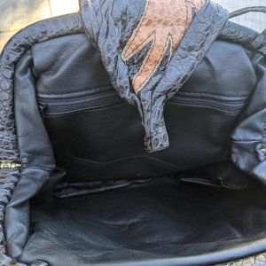 Never used a leather handbag